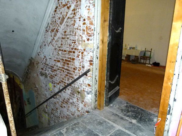 Muratura in mattoni nel vano scala, databile al 1300